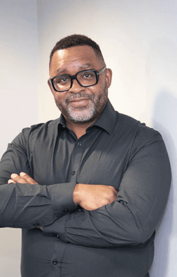 Dr Karl George MBE